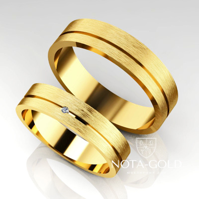 Обручальные кольца Комфорт с бриллиантом в женском кольце (Вес пары: 7,5 гр.)