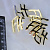 Корпоративные значки в виде букв логотипа из жёлтого золота с бриллиантами (Вес: 4 гр.)