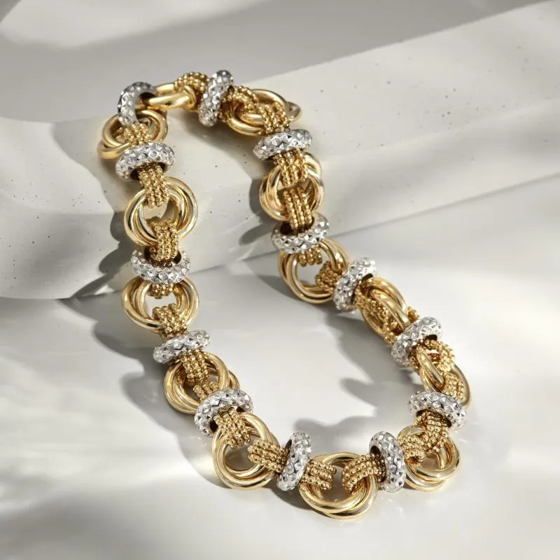 Женский плетеный золотой браслет