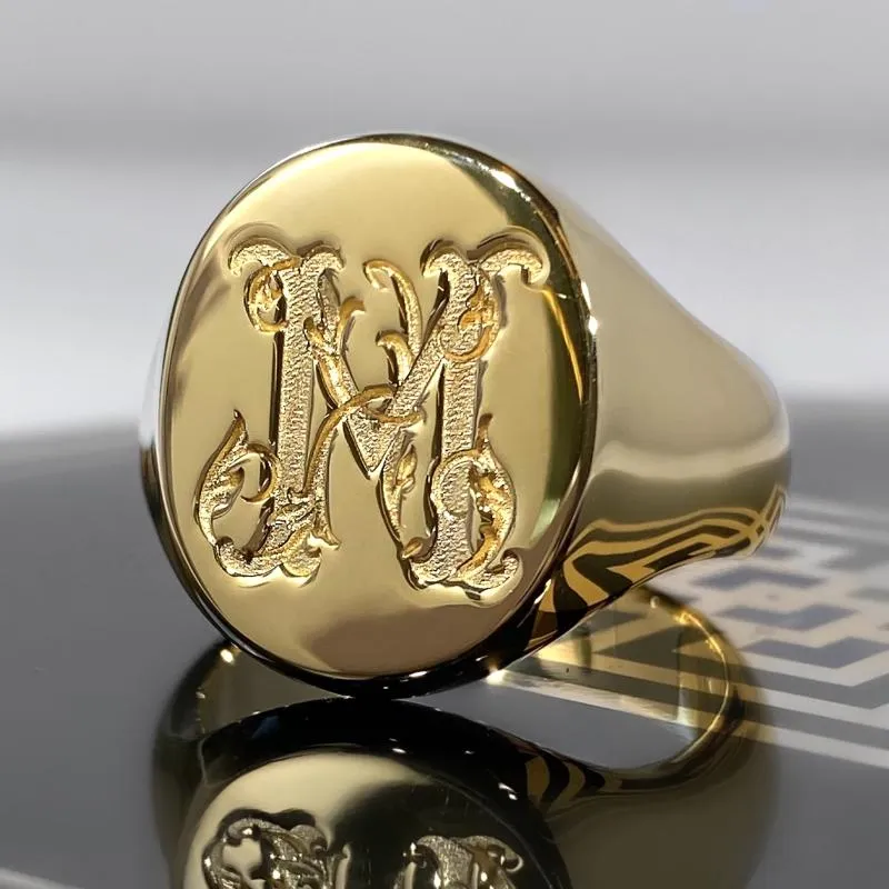 Мужская печатка с вензелем М из желтого золота