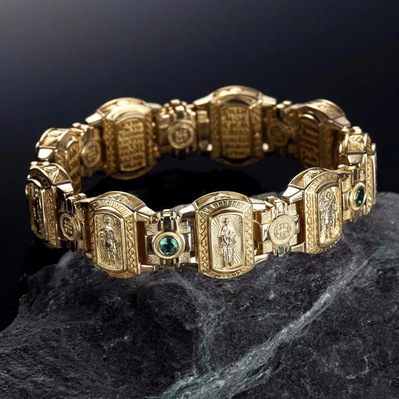 Мужской православный браслет с ликами святых из жёлтого золота и изумрудами