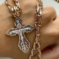 Эксклюзивный золотой крест с эмалью и бриллиантами на цепочке плетения Гелиос