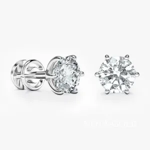 Женские серьги пусеты гвоздики с искусствеными бриллиантами 0,65ct 5,7мм на шести крапанах (Вес 1,5 гр.)