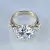 Женское кольцо из белого золота с муассанитами (Вес: 8 гр.)