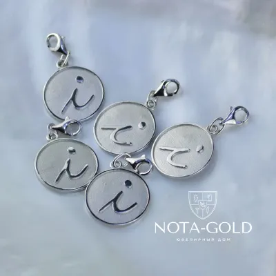 Корпоративные значки - брелки из платины 950 пробы с логотипом (вес 4,5 гр.)
