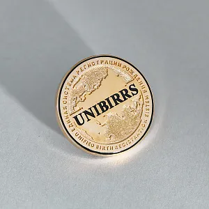 Памятная корпоративная медаль монета Unibirrs из серебра с позолотой (Вес 12,3 гр.)
