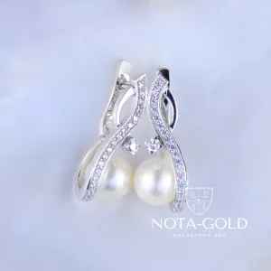 Серьги из белого золота с жемчугом и бриллиантами (Вес: 9 гр.)