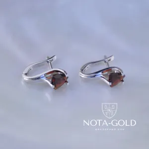 Женские серьги из белого золота с гранатами (Вес: 5 гр.)