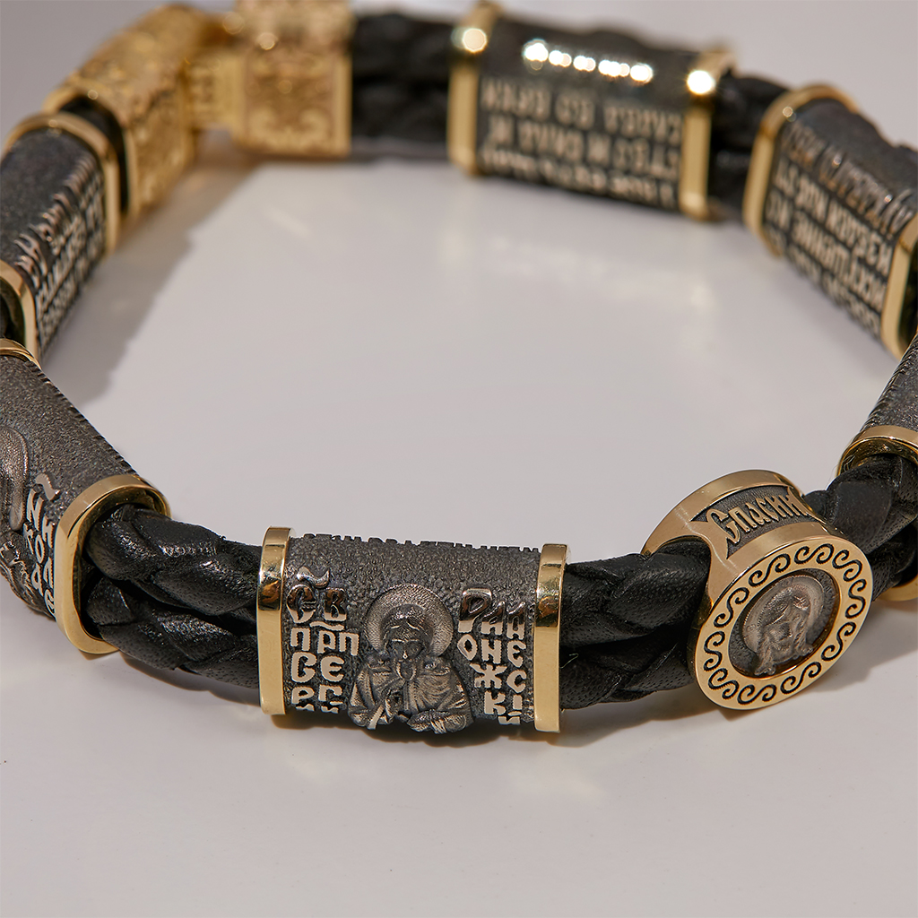 Православный мужской браслет из кожи с вставками жёлто-белого золота сликами Святых (Вес: 61 гр.)