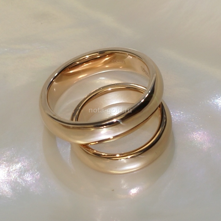 Ювелирная мастерская Nota-Gold изготовит на заказ классические обручальные кольца.