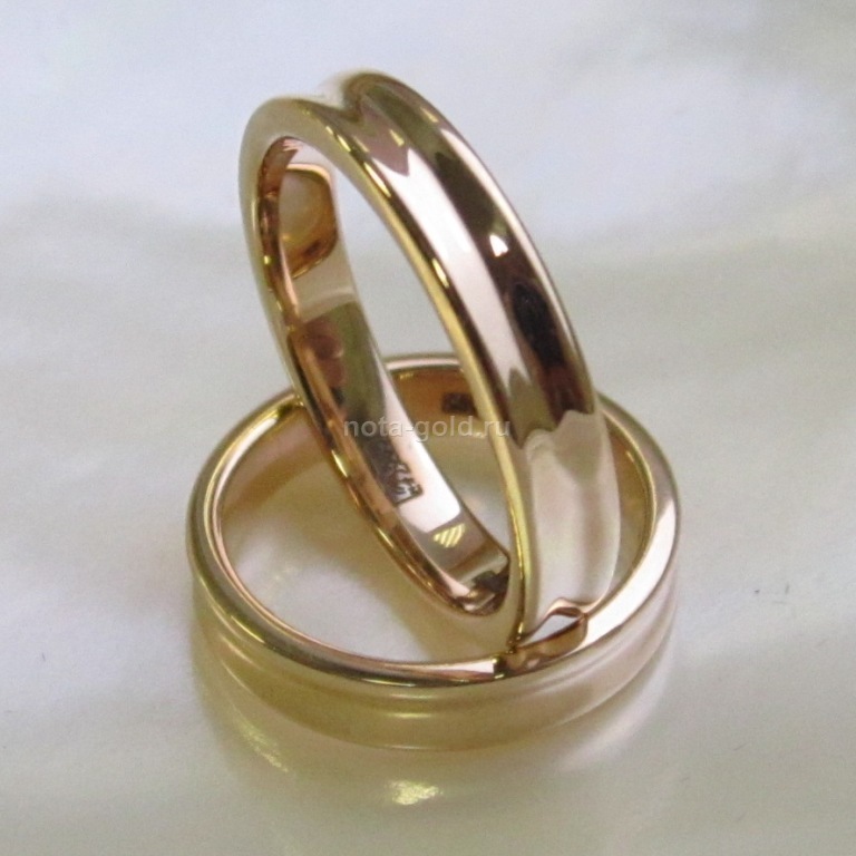 Ювелирная мастерская Nota-Gold изготовила на заказ узкие обручальные кольца.