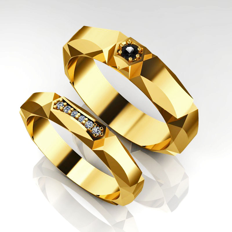 Обручальные кольца Игра с бриллиантами в женском и чёрным бриллиантом в мужском (Вес пары: 9 гр.)