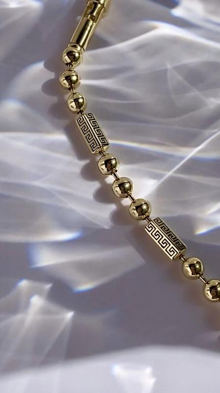 Браслет греческий меандр из жёлтого золота и чёрной эмали