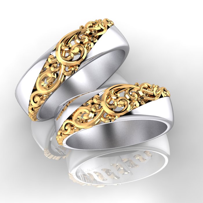 Обручальные кольца Алюр из белого золота с узорчатой вставкой из жёлтого золота (Вес пары: 13 гр.)