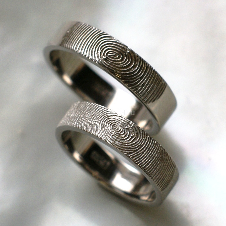 Ювелиры мастерской Nota-Gold изготовили на заказ необычные обручальные кольца.