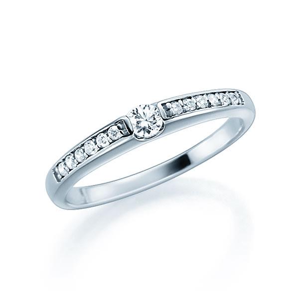 Женское кольцо из белого золота с одним крупным и двенадцатью маленькими бриллиантами 0,14 карат (Вес: 3 гр.)