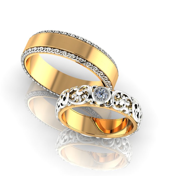 Обручальные кольца Весна из жёлто-белого золота с бриллиантом и узором (Вес пары: 13 гр.)