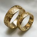 Ювелирная мастерская Nota-Gold изготовила на заказ обручальные кольца со славянской символикой