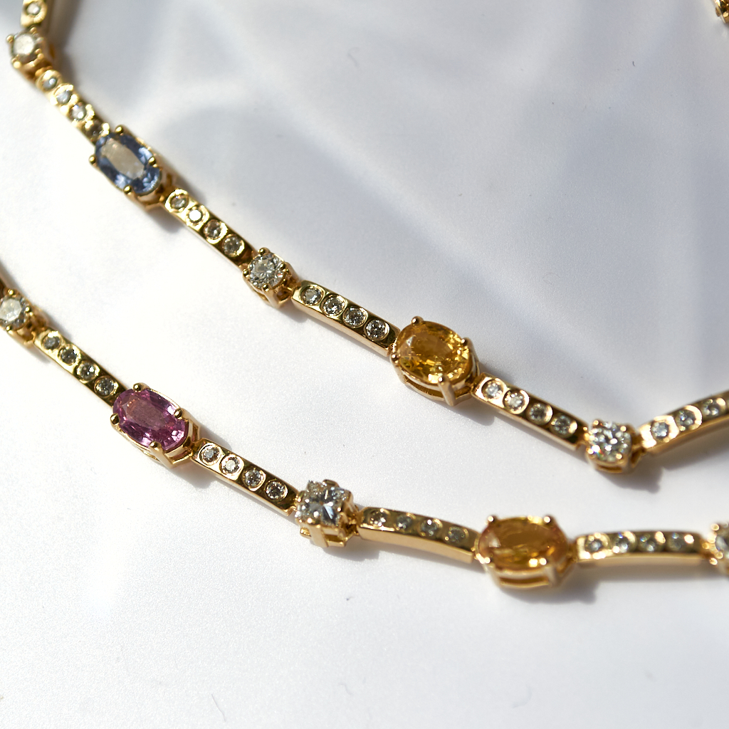 Золотые парные браслеты с сапфирами и бриллиантами (цена за грамм)