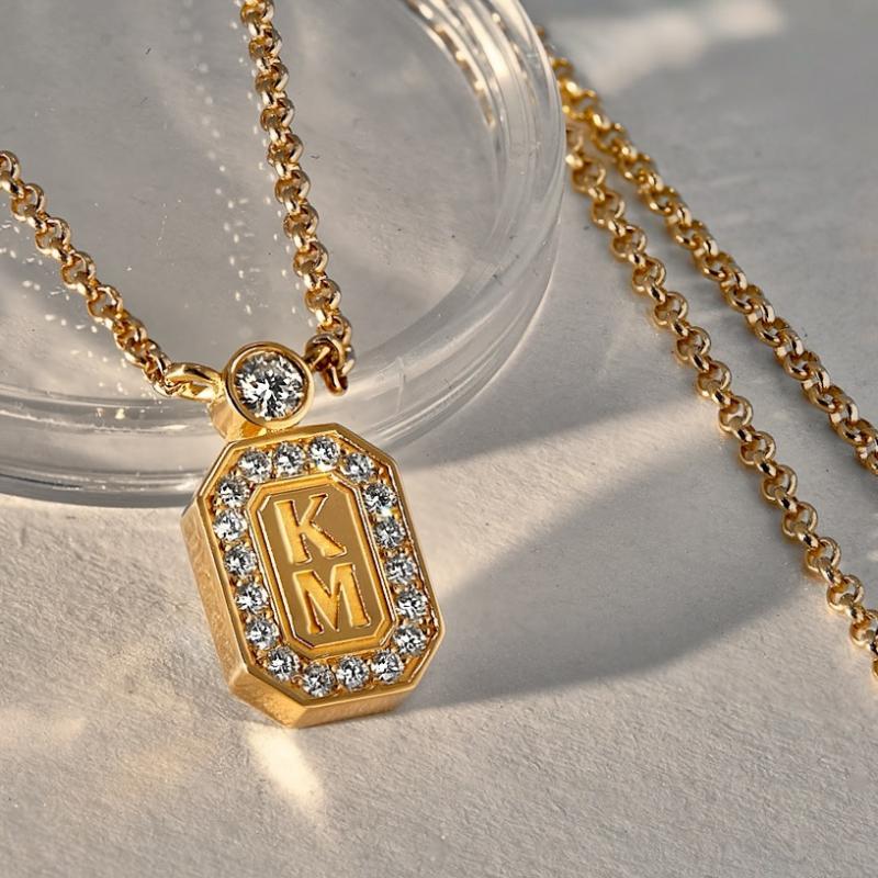 Подвеска с инициалами КМ из желтого золота с бриллиантами