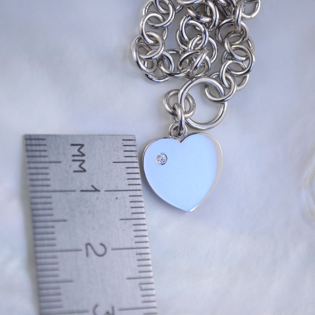 Женский золотой браслет с подвеской в виде сердца с бриллиантом (цена за грамм)