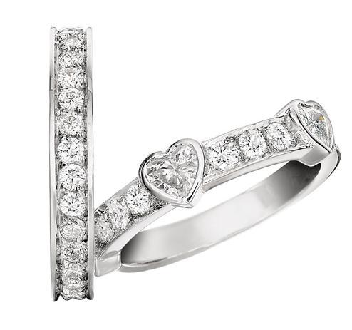 Обручальные кольца из платины с эксклюзивными бриллиантами в виде сердца  на заказ (Вес пары: 13 гр.)