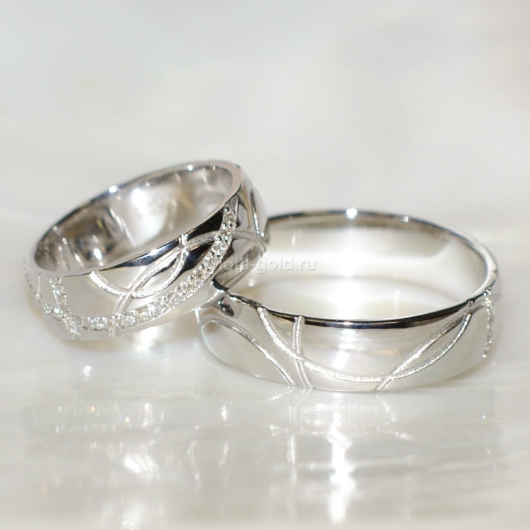 Ювелиры мастерской Nota-Gold изготовили на заказ оригинальные обручальные кольца.