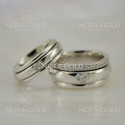 Подвижные обручальные кольца из белого золота с крутящейся вставкой и бриллиантами (Вес пары: 21 гр.)