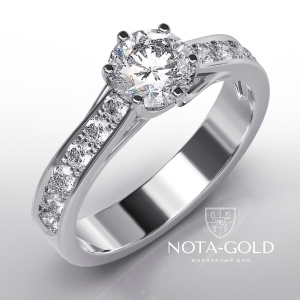 Кольцо из белого золота с бриллиантом 0,7ct и дорожкой бриллиантов (Вес 3,4 гр. )