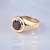 Перстень из красного золота с завальцованным круглым гранатом (Вес: 12 гр.)