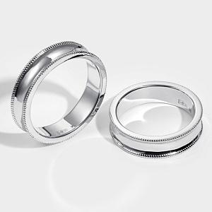 Обручальные кольца вогнутого сечения из белого золота с узором (Вес пары 12 гр.)