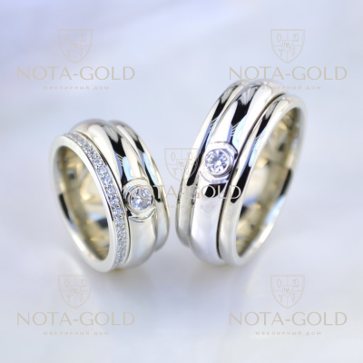 Широкие обручальные кольца из белого золота с крутящейся вставкой и бриллиантами (Вес пары: 29 гр.)