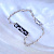 Женский браслет плетение Бесконечность из белого золота с сапфирами клиента на пластине (цена за грамм)