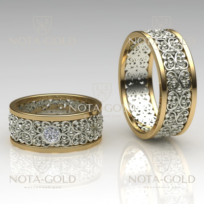 Парные обручальные кольца с большим бриллиантом в женском кольце (Вес пары: 15 гр.)