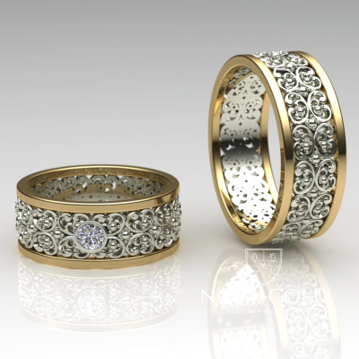 Парные обручальные кольца с большим бриллиантом в женском кольце (Вес пары: 15 гр.)
