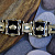 Мужской авторский браслет из жёлтого золота с эмалью, инициалами и изумрудами (Вес 132 гр.)