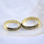 Обручальные кольца из жёлтого золота с отпечатками, эмалью и личной гравировкой (Вес пары: 11 гр.)