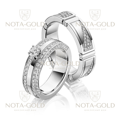 Массивные платиновые обручальные кольца с многочисленными бриллиантами в мужском и женском кольце (Вес пары: 24 гр.)