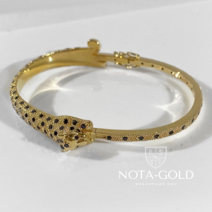 Жесткий браслет скоба Ягуар из желтого золота с черными бриллиантами (Вес 24,5 гр.)