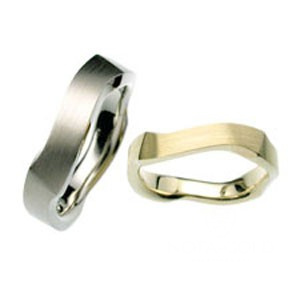 Обручальные кольца из платины необычной формы на заказ (Вес пары: 18 гр.)