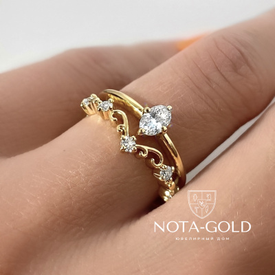 Женское двойное кольцо из желтого золота  с бриллиантами (Вес 3,4 гр.)