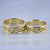Обручальные кольца из жёлтого золота с рельефным узором мужское без камней женское с камнями (Вес пары: 15 гр.)