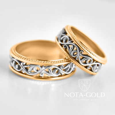 Золотые двухцветные обручальные кольца с рельефным узором (Вес пары 19 гр.)
