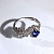 Женское кольцо из белого золота с бриллиантовым пером и камнем танзанит (Вес 3,3 гр.)