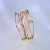 Женское кольцо в виде волн из красного золота с бриллиантами (Вес: 5 гр.)