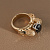 Золотое кольцо-перстень в виде львов держащих изумруд со съёмным механизмом каста (Вес: 27 гр.)