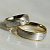 Двухцветные обручальные кольца с растительным узором и фактурной поверхностью на заказ (Вес пары: 13 гр.)