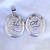 Кулон-медальон из серебра с двумя фотографиями и инициалами супругов (Вес: 30 гр.)