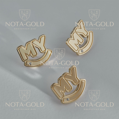 Значки из жёлтого золота с буквами и логотипом компании (Вес: 2 гр.)
