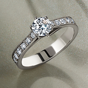 Кольцо из белого золота с бриллиантом 0,7ct и дорожкой бриллиантов (Вес 3,4 гр. )